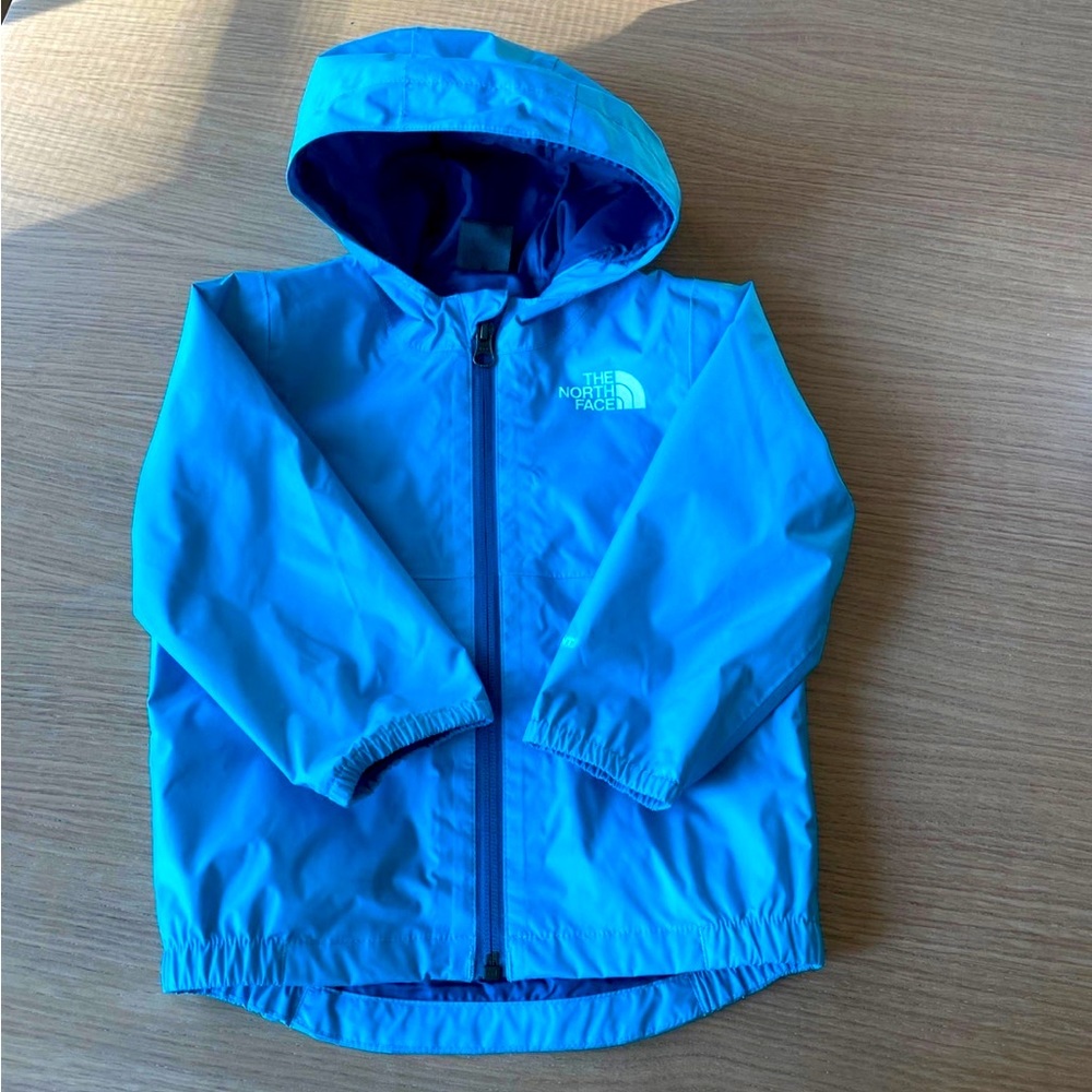 The north face rain jacket/wind breaker 12-18M.